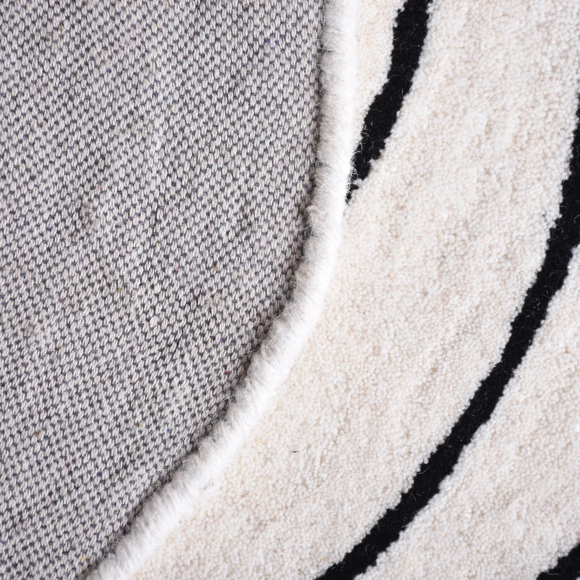 Handmade round wool area rug